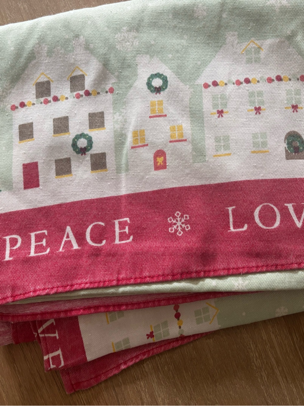St. Nicholas Square Holiday Village Table cloth in Red, Green, White